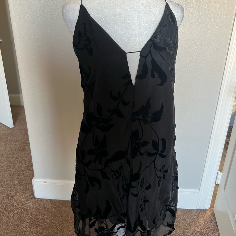 Black mini dress with felt details